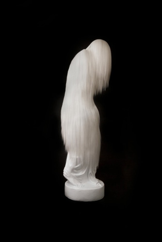 <b>Untitled (white figure), 2014  </b><br />57"H x 20" x 18"<br />resin figure, synthetic hair, glue, paintpaint